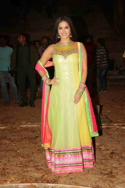 Actress Sunny Leone Stills In Yellow Dress 6